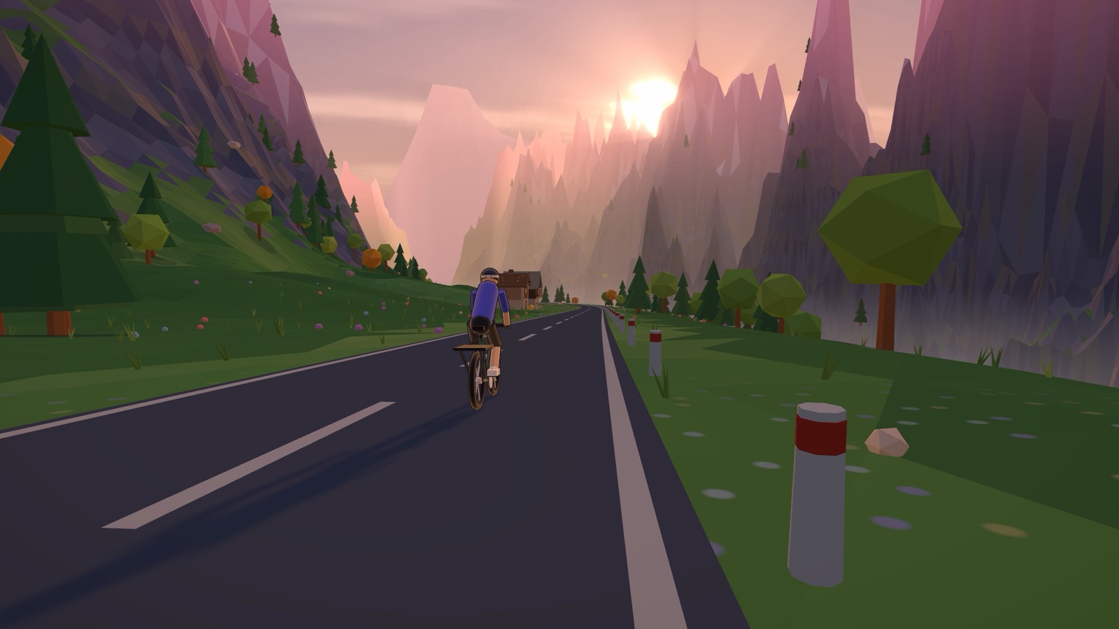 A rider cycling towards the sun setting between mountain peaks